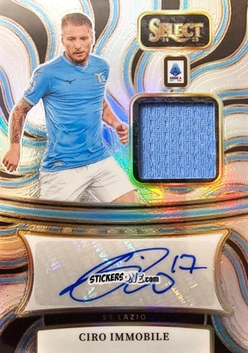 Figurina Ciro Immobile - Select Serie A 2024-2025
 n. AM10 - Panini